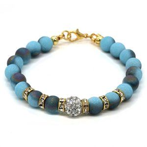 Blue matte stone bracelet with lobster clasp.